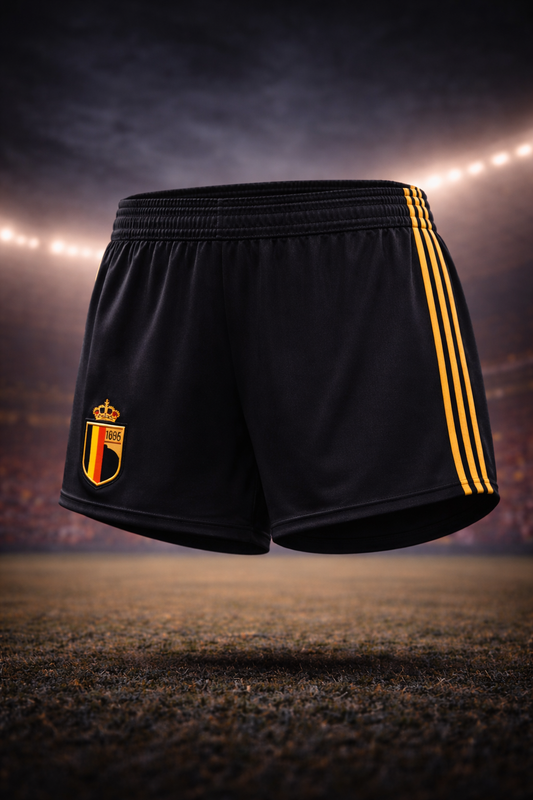 Black shorts with yellow stripes and a logo on a dark background for woman